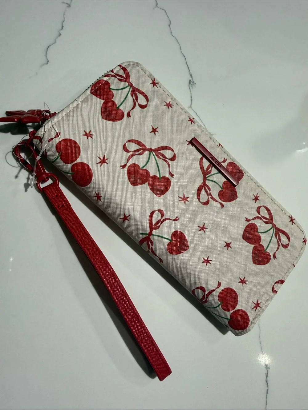 ALDO Cherry Print Zip AroundALDO Cherry Print Zip Around Wallet with Wrist Strap